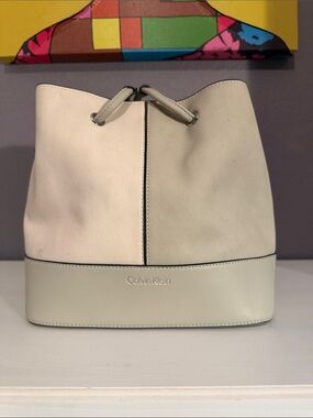 Calvin Klein Two-Tone Cream Drawstring Bucket Shoulder Bag